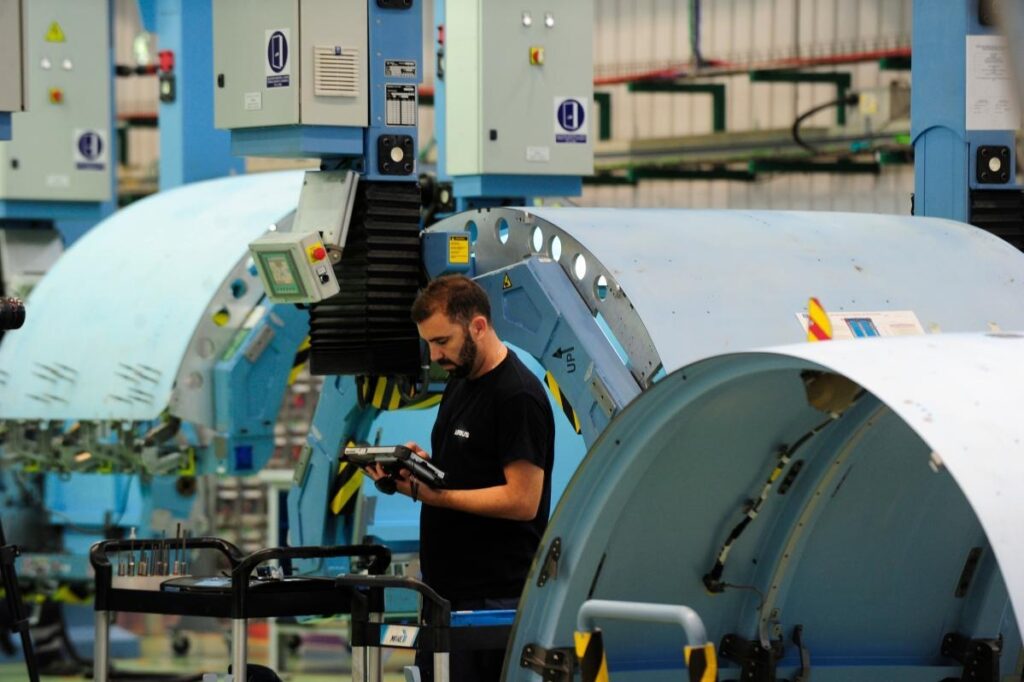A worker directs the EUROC drone at the Airbus factory in Cadiz